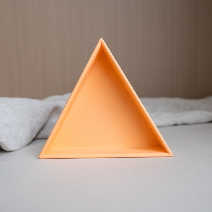 Grennn inlegdriehoek 'mandigo' pastel oranje