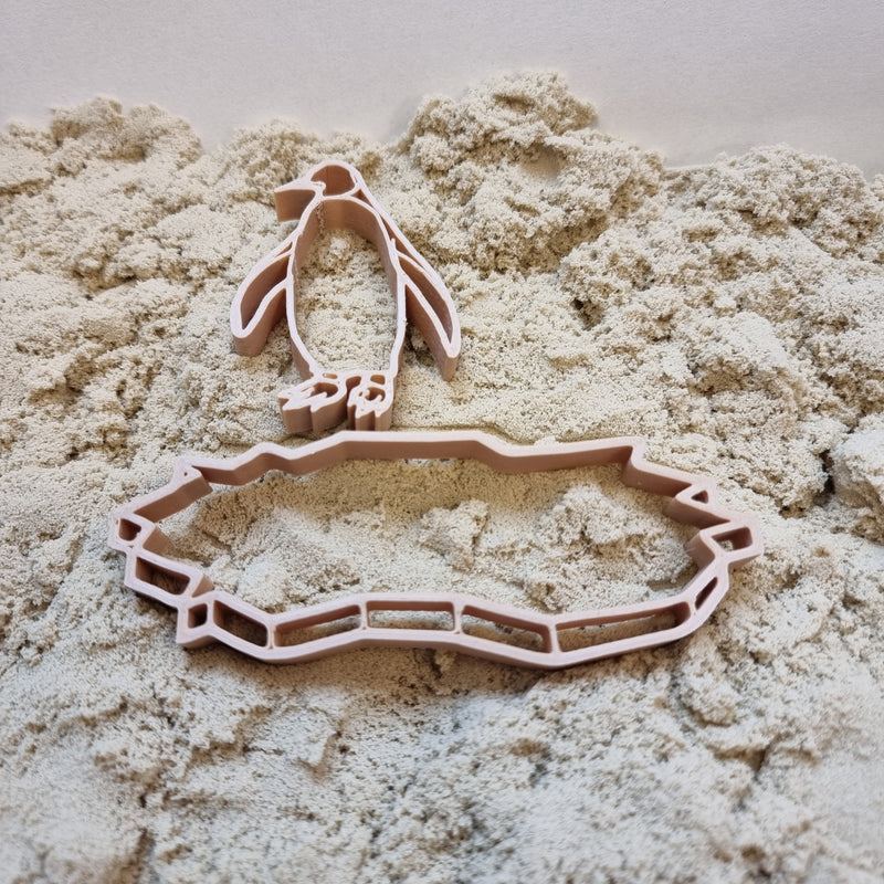 Grennn pinguïn en ijsschots uitsteker